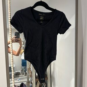 Black stretchy t shirt body suit size S/M